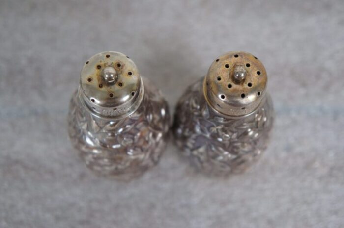 antique dominick and haff repousse floral sterling silver salt and pepper shakers a pair 5077