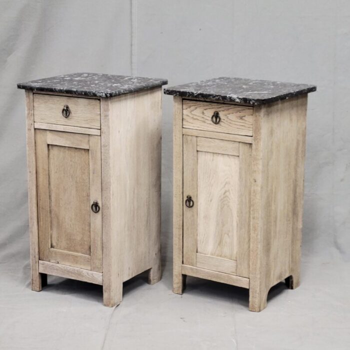 antique english bleached oak nightstands with black marble tops a near pair 8249