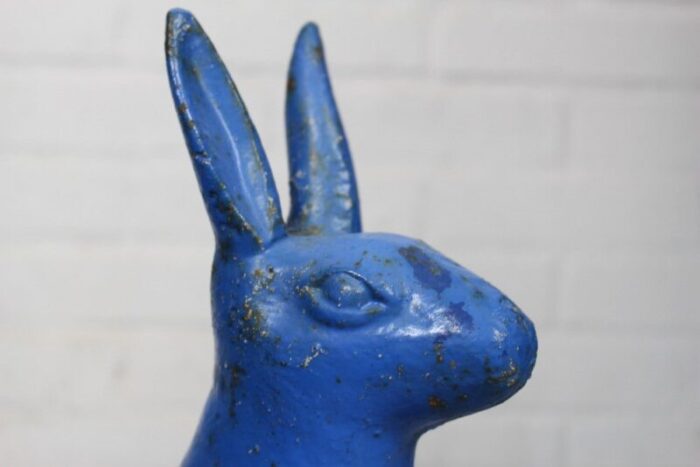 antique sculptural figural blue painted cast iron rabbit doorstops set of 2 12