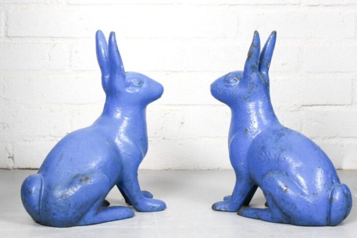 antique sculptural figural blue painted cast iron rabbit doorstops set of 2 6