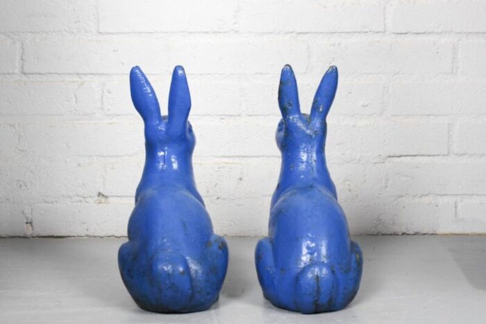 antique sculptural figural blue painted cast iron rabbit doorstops set of 2 8