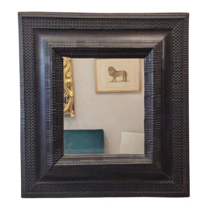 baroque mirror with ebonized and curly wood frame 18th century 0945