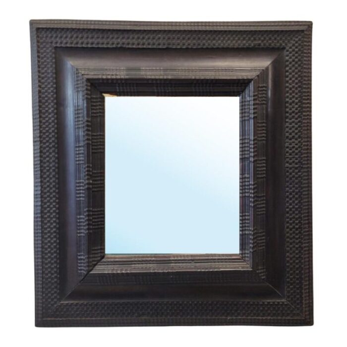 baroque mirror with ebonized and curly wood frame 18th century 8304