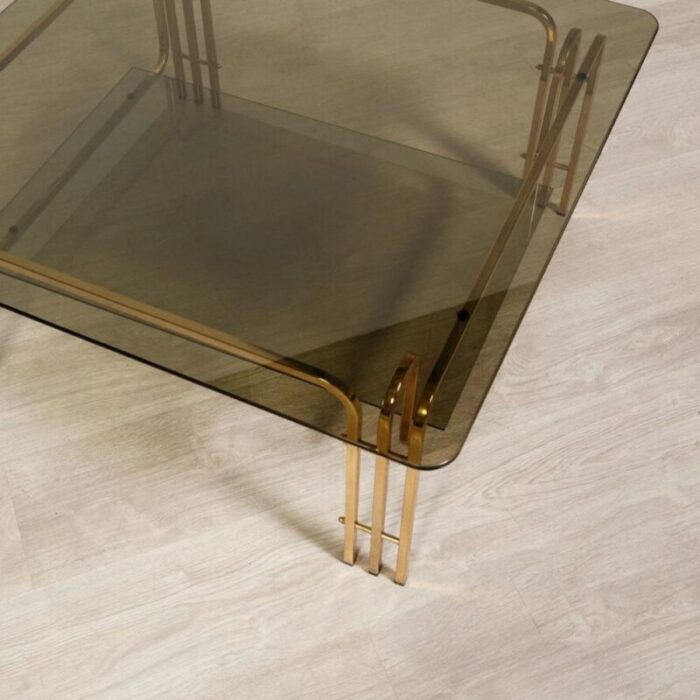 coffee table in gold colored metal and smoked glass 1970s 1096