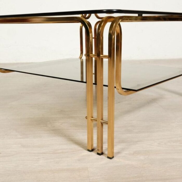 coffee table in gold colored metal and smoked glass 1970s 4888