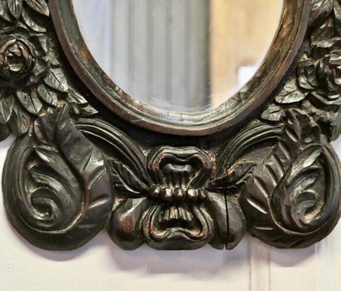 gothic carved oak oval mirror 1235