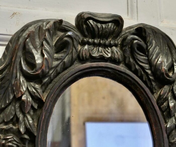 gothic carved oak oval mirror 1938