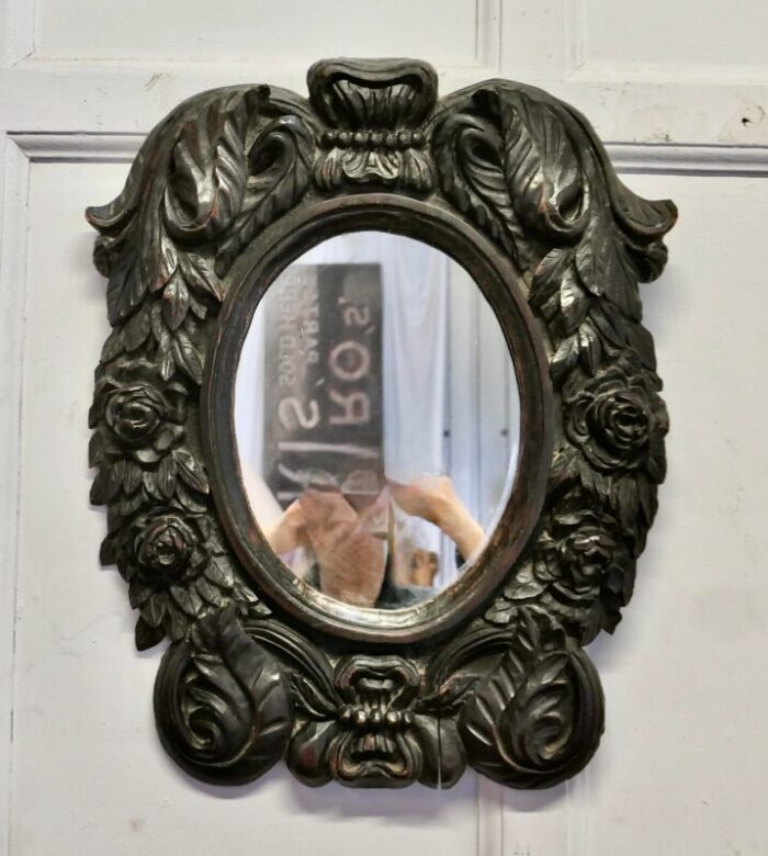 gothic carved oak oval mirror 2320