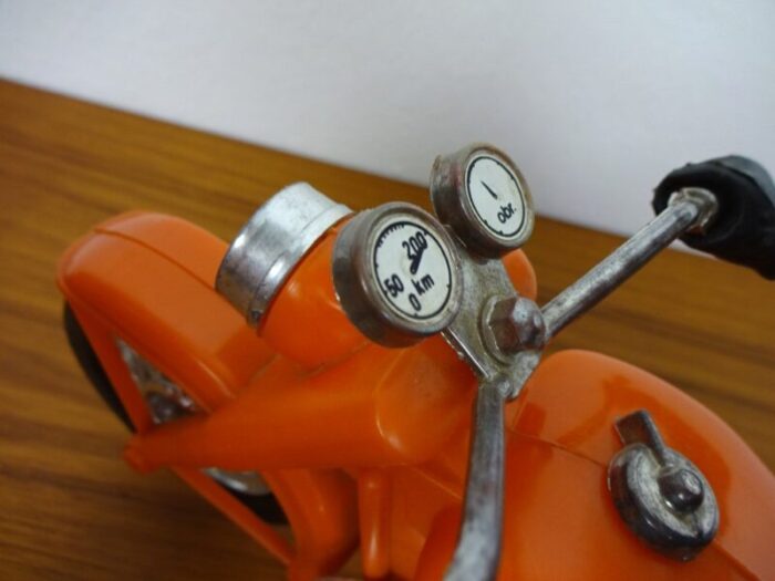 large vintage orange plastic motorcycle 1970s 10