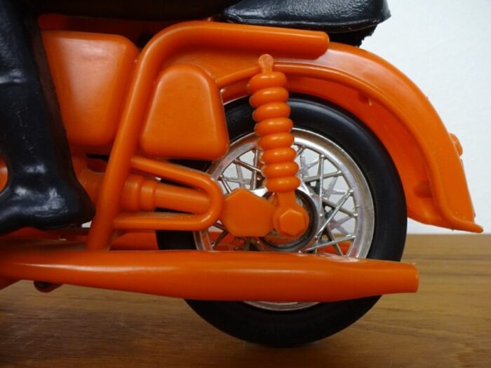 large vintage orange plastic motorcycle 1970s 12