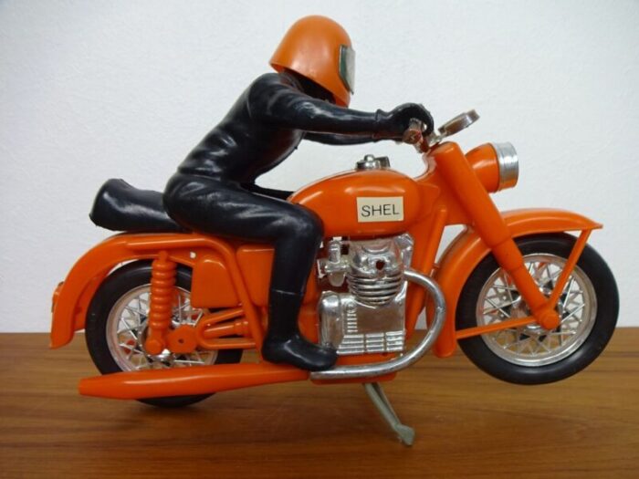 large vintage orange plastic motorcycle 1970s 3