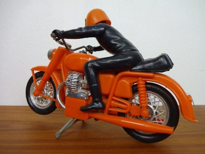 large vintage orange plastic motorcycle 1970s 4