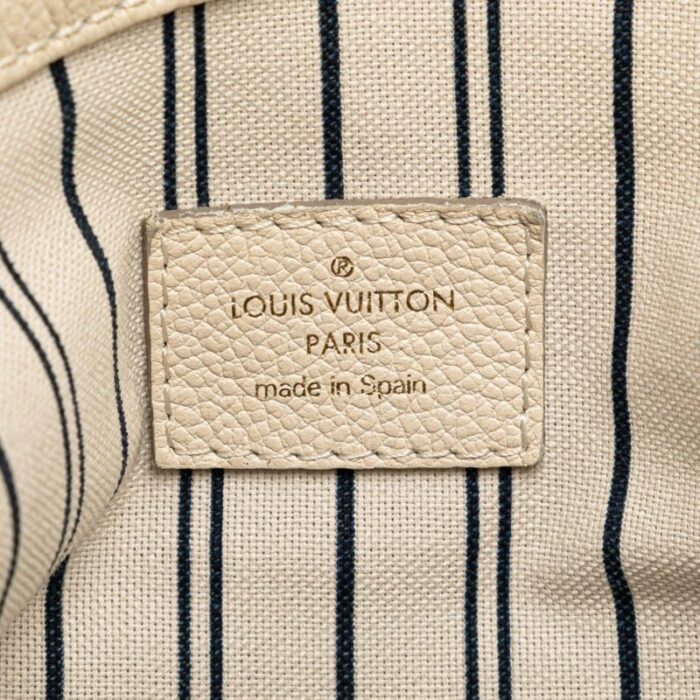 louis vuitton monogram empreinte artsy mm white 9749