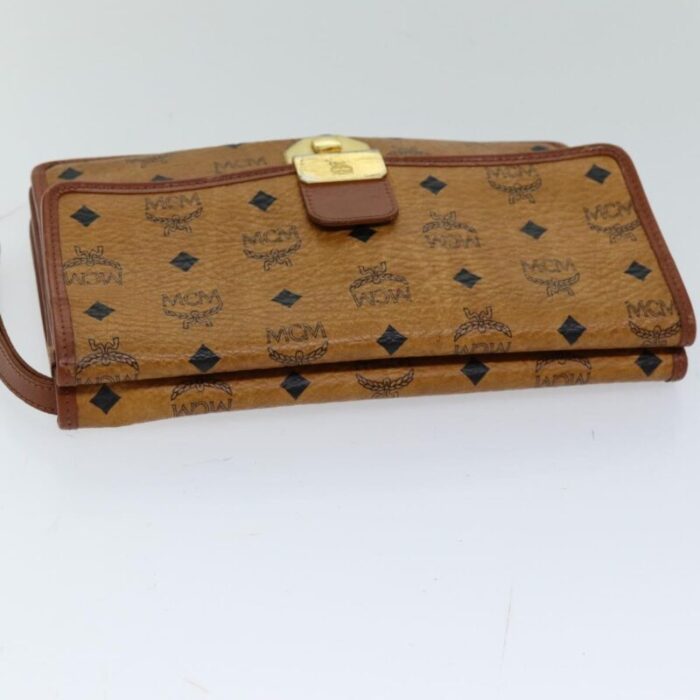 mcm vicetos logogram clutch bag pvc brown auth 74415 1593