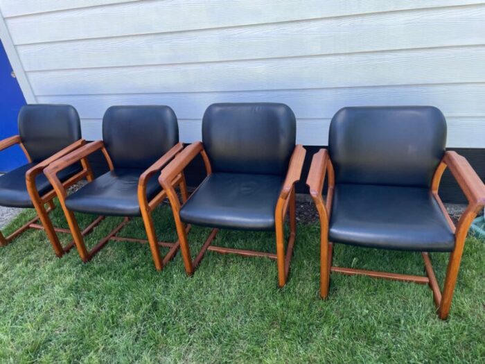 mid century danish modern teak and black leather dining arm chairs by benny linden set of 4 8946