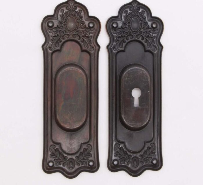 pair of late 20th century victorian japanned steel pocket door plates 2005