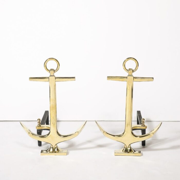 pair of mid century modernist anchor andirons in polished brass 0776