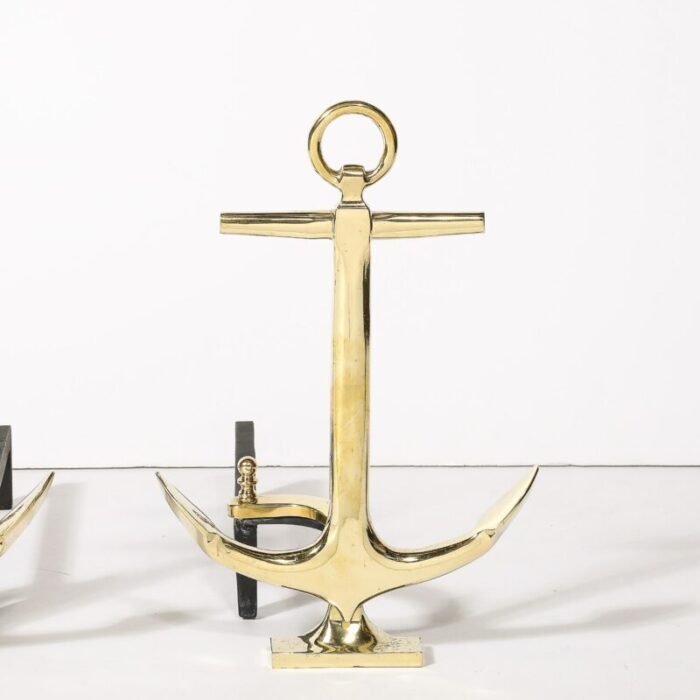 pair of mid century modernist anchor andirons in polished brass 2859