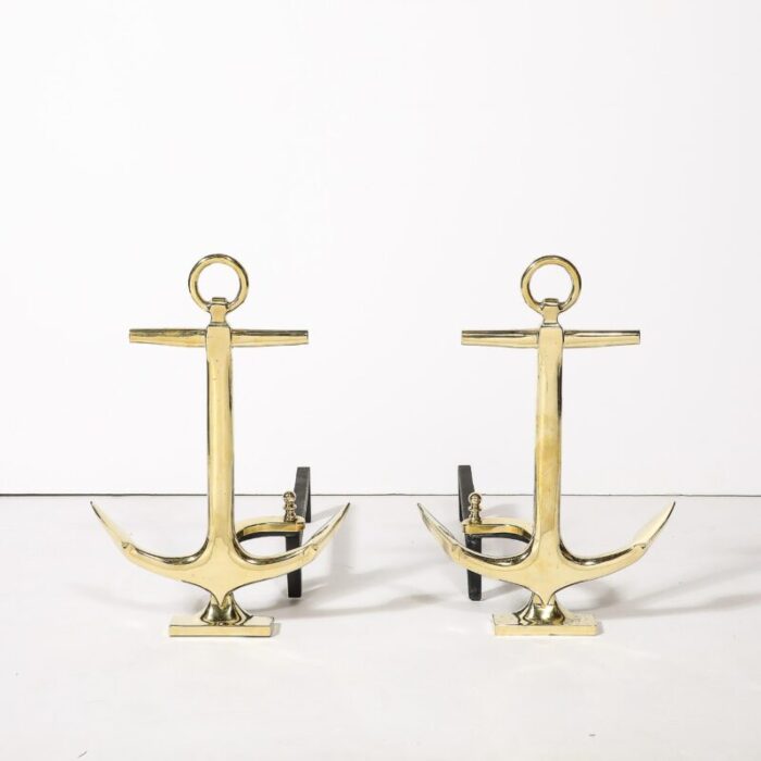 pair of mid century modernist anchor andirons in polished brass 5129