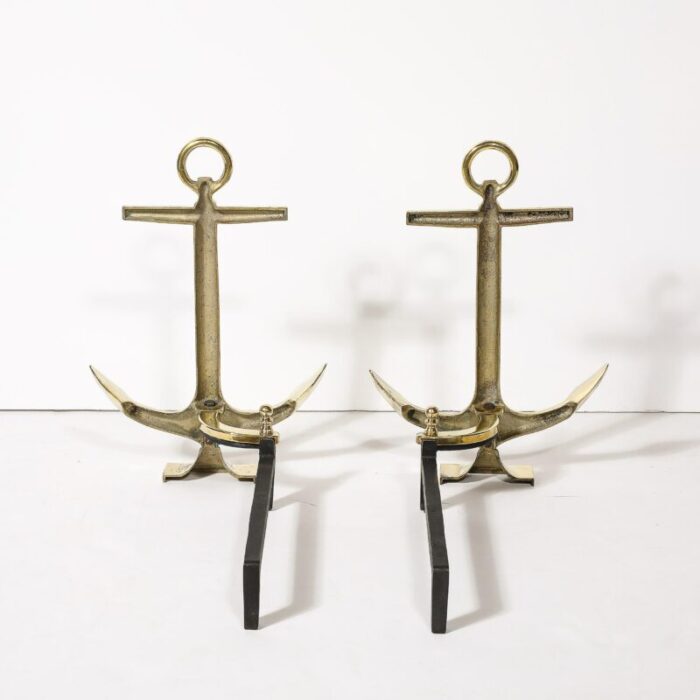 pair of mid century modernist anchor andirons in polished brass 5434