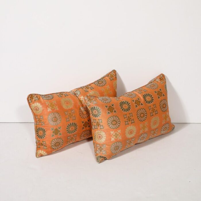 pair of silk and down stuffed pillows in orange and emerald green eastern patterning 1451