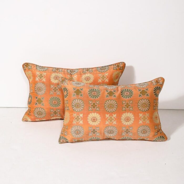 pair of silk and down stuffed pillows in orange and emerald green eastern patterning 4592