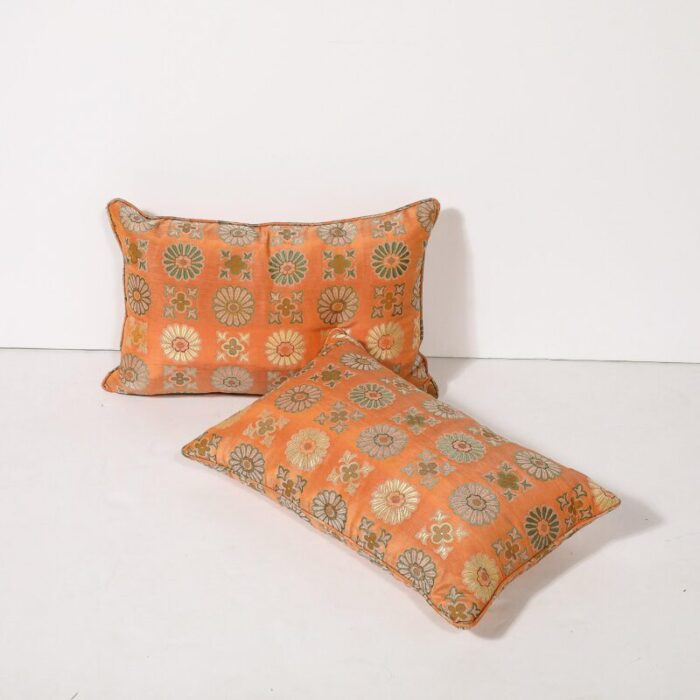 pair of silk and down stuffed pillows in orange and emerald green eastern patterning 7906