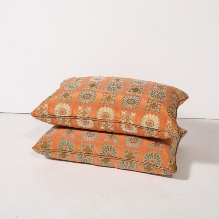 pair of silk and down stuffed pillows in orange and emerald green eastern patterning 8552