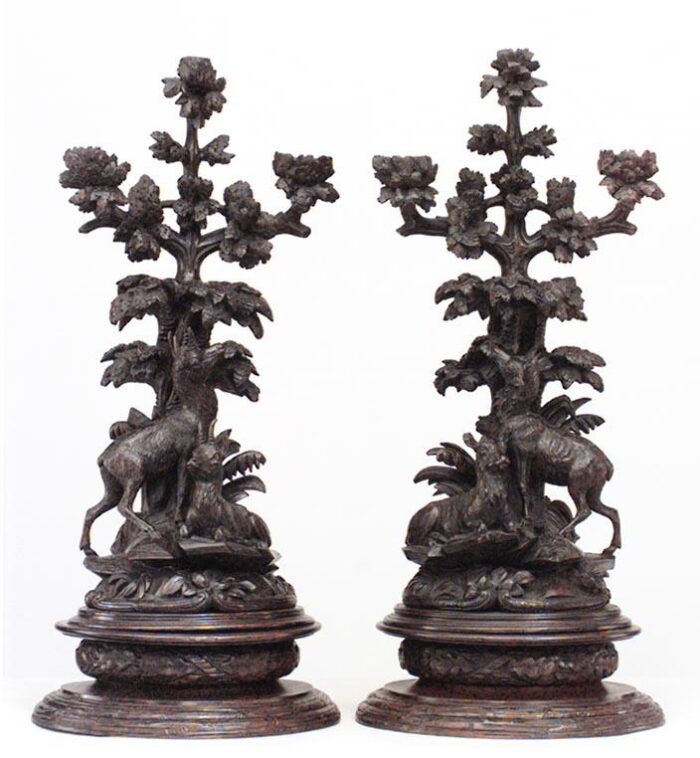 rustic black forest carved walnut candelabras a pair 5213