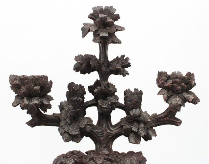 rustic black forest carved walnut candelabras a pair 6098