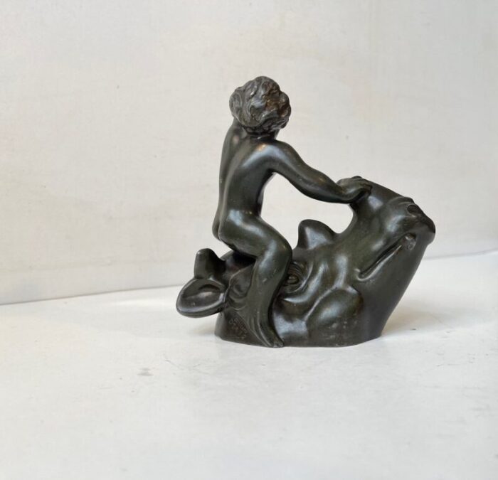 vintage art deco figurine with boy on rhino by just andersen 1930s 2