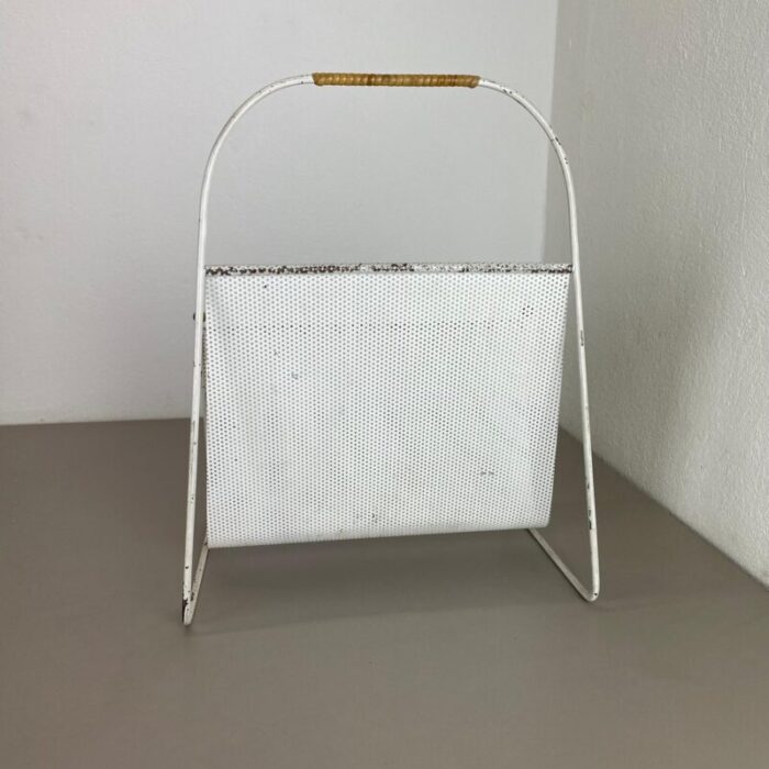 white metal hole pattern magazine holder by carl auboeck for mategot france 1950s 6